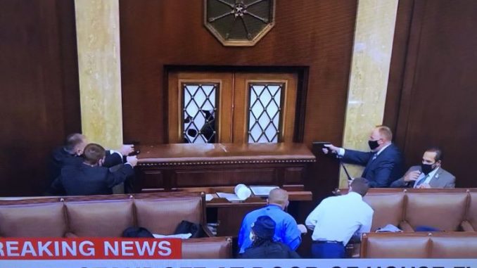 Си-Eн-Eн објави фотографија од вооружена пресметка во Претставничкиот дом